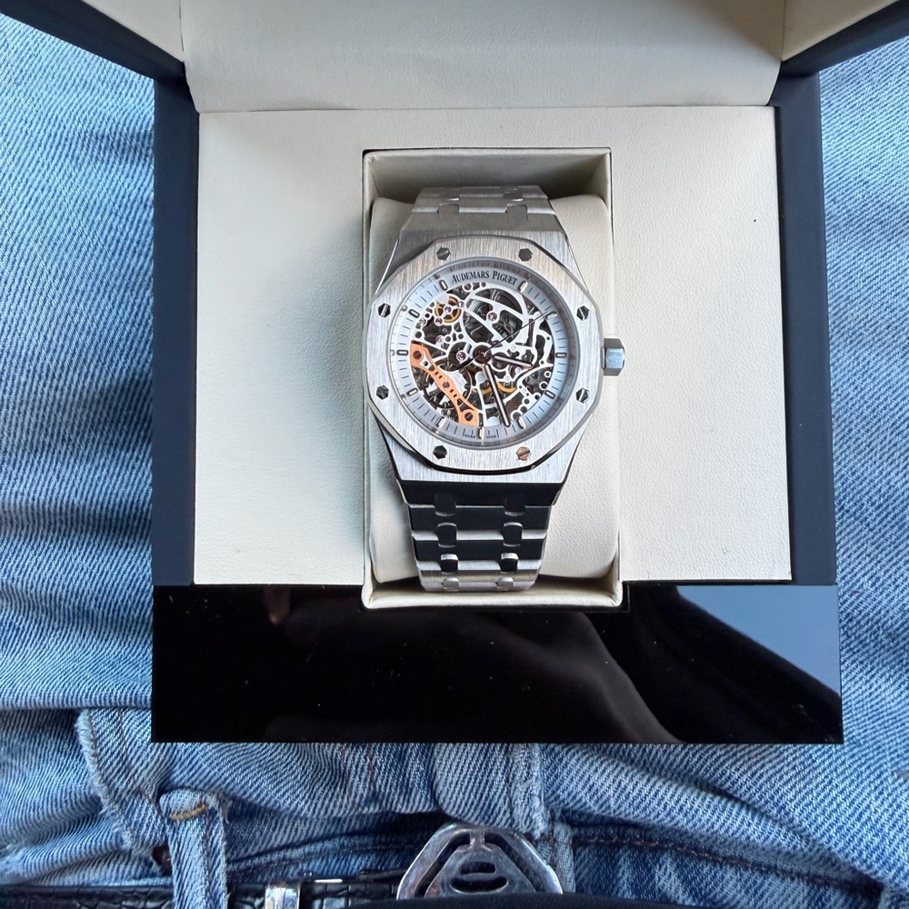Audemars Piguet Silver and Orange Skeleton Watch